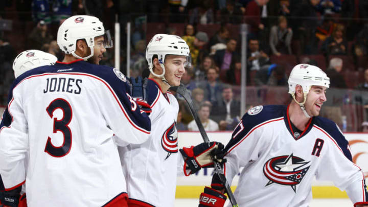 VANCOUVER, BC - FEBRUARY 4: Brandon Dubinsky #17 and Seth Jones #3 celebrate the shootout winning goal by Alexander Wennberg #41 of the Columbus Blue Jackets against the Vancouver Canucks during their NHL game at Rogers Arena February 4, 2016 in Vancouver, British Columbia, Canada. Columbus won 2-1 in a shootout. (Photo by Jeff Vinnick/NHLI via Getty Images)