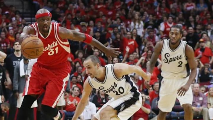 HOUSTON, TX - DECEMBER 25: Jason Terry #31 of the Houston Rockets and Manu Ginobili #20 of the San Antonio Spurs battle for the basketball during their game at the Toyota Center on December 25, 2015 in Houston, Texas. NOTE TO USER: User expressly acknowledges and agrees that, by downloading and or using this Photograph, user is consenting to the terms and conditions of the Getty Images License Agreement. (Photo by Scott Halleran/Getty Images)