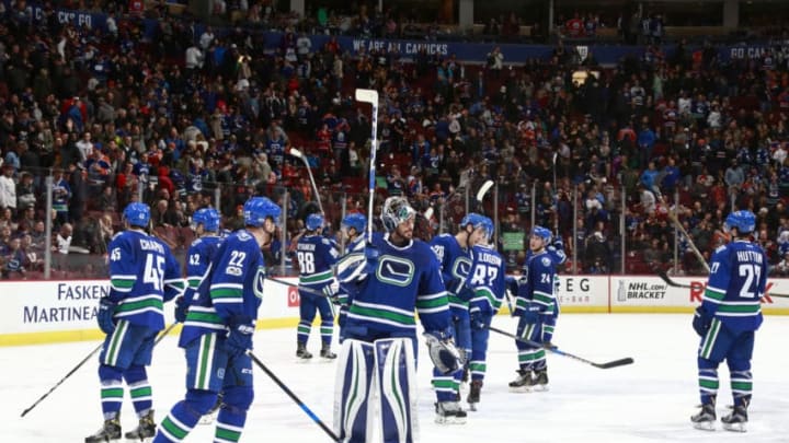 VANCOUVER, BC - APRIL 8: The Vancouver Canucks wave to the fans at the end of their NHL game against the Edmonton Oilers at Rogers Arena April 8, 2017 in Vancouver, British Columbia, Canada. The Oilers won 3-2. (Photo by Jeff Vinnick/NHLI via Getty Images)