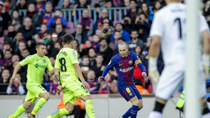 11th February 2018, Camp Nou, Barcelona, Spain; La Liga football, Barcelona versus Getafe; Andres Iniesta holds off Mauro Arambarri of Getafe (Photo by Pedro Salado/Action Plus via Getty Images)