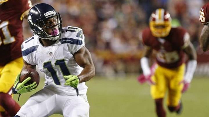 Oct 6, 2014; Landover, MD, USA; Seattle Seahawks wide receiver Percy Harvin (11) runs with the ball against the Washington Redskins at FedEx Field. Mandatory Credit: Geoff Burke-USA TODAY Sports
