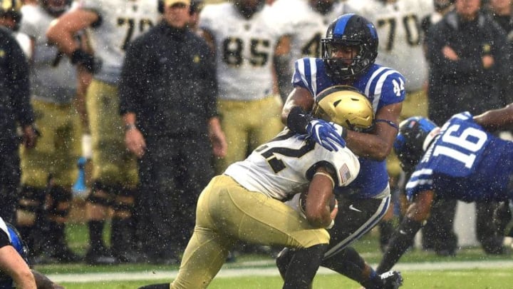 DURHAM, NC - OCTOBER 08: Joe Giles-Harris #44 of the Duke Blue Devils tries to tackle Tyler Campbell #22 of the Army Black Knights during a kickoff return at Wallace Wade Stadium on October 8, 2016 in Durham, North Carolina. (Photo by Lance King/Getty Images)