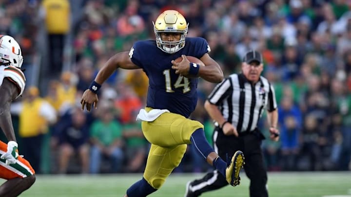 Oct 29, 2016; South Bend, IN, USA; Notre Dame Fighting Irish quarterback DeShone Kizer (14) runs in the third quarter against the Miami Hurricanes at Notre Dame Stadium. Notre Dame won 30-27. Mandatory Credit: Matt Cashore-USA TODAY Sports