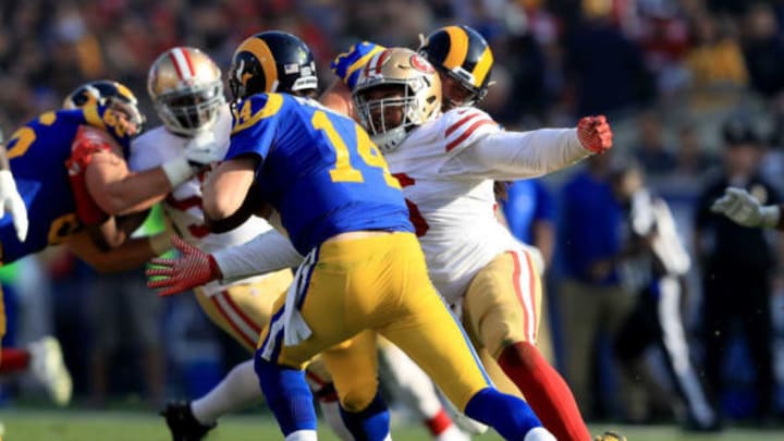 LOS ANGELES, CA – DECEMBER 31: Sheldon Day #96 of the San Francisco 49ers sacks Sean Mannion #14 of the Los Angeles Rams during the first half of a game at Los Angeles Memorial Coliseum on December 31, 2017 in Los Angeles, California. (Photo by Sean M. Haffey/Getty Images)