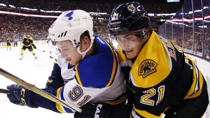 Dec 22, 2015; Boston, MA, USA; St. Louis Blues right wing Vladimir Tarasenko (91) and Boston Bruins left wing Loui Eriksson (21) battle for position during the first period at TD Garden. Mandatory Credit: Winslow Townson-USA TODAY Sports