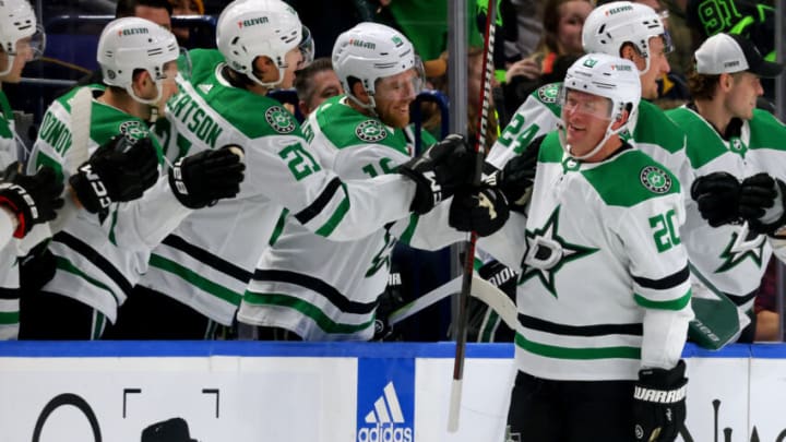 Mar 9, 2023; Buffalo, New York, USA; Dallas Stars defenseman Ryan Suter (20) celebrates his goal with teammates during the second period against the Buffalo Sabres at KeyBank Center. Mandatory Credit: Timothy T. Ludwig-USA TODAY Sports