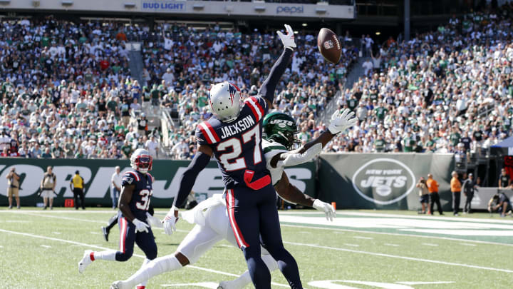 EAST RUTHERFORD, NEW JERSEY – SEPTEMBER 19: (NEW YORK DAILIES OUT) J.C. Jackson #27 of the New England Patriots in action against Corey Davis #84 of the New York Jets at MetLife Stadium on September 19, 2021 in East Rutherford, New Jersey. The Patriots defeated the Jets 25-6. (Photo by Jim McIsaac/Getty Images)