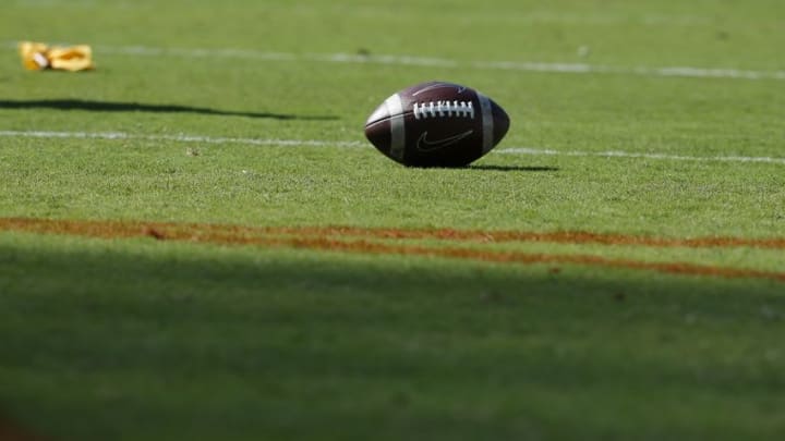 Sep 19, 2015; Charlottesville, VA, USA; A official ball and yellow flag rest on the field during the game between the Virginia Cavaliers and the William & Mary Tribe at Scott Stadium. Mandatory Credit: Amber Searls-USA TODAY Sports
