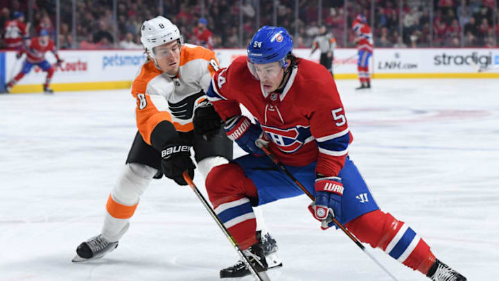 MONTREAL, QC - JANUARY 19: Charles Hudon #54 of the Montreal Canadiens skates with the puck under pressure from Robert Hagg #8 of the Philadelphia Flyers in the NHL game at the Bell Centre on January 19, 2019 in Montreal, Quebec, Canada. (Photo by Francois Lacasse/NHLI via Getty Images)