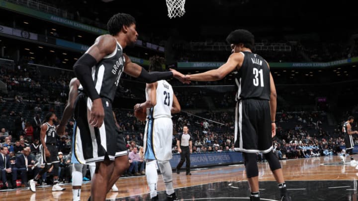 BROOKLYN, NY - MARCH 19: Jarrett Allen #31 and Rondae Hollis-Jefferson #24 of the Brooklyn Nets high five against the Memphis Grizzlies on March 19, 2018 at Barclays Center in Brooklyn, New York. NOTE TO USER: User expressly acknowledges and agrees that, by downloading and or using this Photograph, user is consenting to the terms and conditions of the Getty Images License Agreement. Mandatory Copyright Notice: Copyright 2018 NBAE (Photo by Joe Murphy/NBAE via Getty Images)