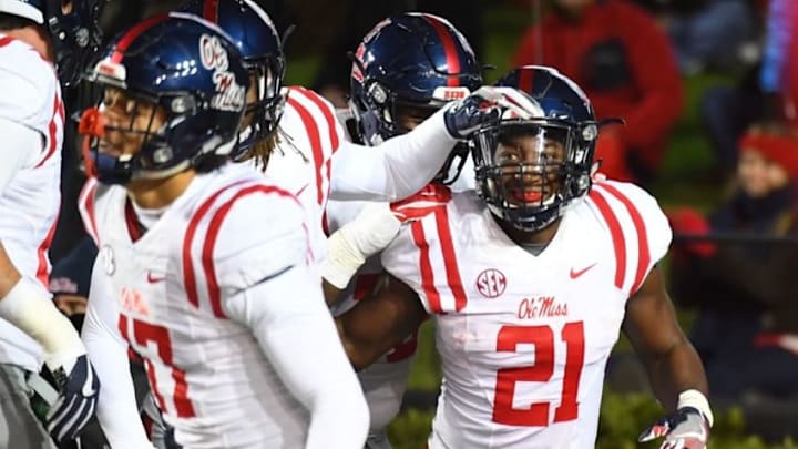 Nov 19, 2016; Nashville, TN, USA; Mississippi Rebels quarterback Akeem Judd (21) celebrates after a touchdown during the first half against the Vanderbilt Commodores at Vanderbilt Stadium. Mandatory Credit: Christopher Hanewinckel-USA TODAY Sports