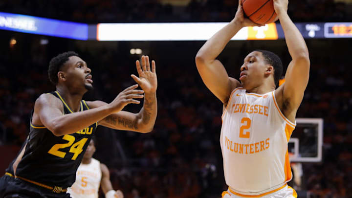 KNOXVILLE, TN - FEBRUARY 5: Grant Williams #2 of the Tennessee Volunteers catches a pass with Kevin Puryear #24 of the Missouri Tigers defending during their game at Thompson-Boling Arena on February 5, 2019 in Knoxville, Tennessee. (Photo by Donald Page/Getty Images)