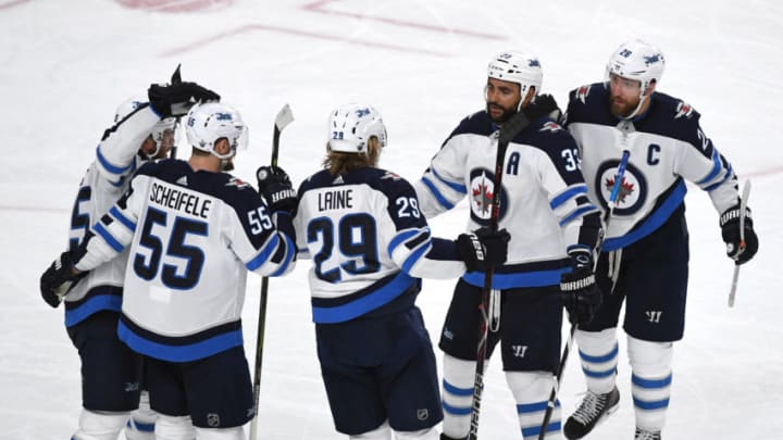 LAS VEGAS, NV – MAY 18: Patrik Laine #29 of the Winnipeg Jets is congratulated by his teammates after scoring a second-period goal against the Vegas Golden Knights in Game Four of the Western Conference Finals during the 2018 NHL Stanley Cup Playoffs at T-Mobile Arena on May 18, 2018 in Las Vegas, Nevada. (Photo by Ethan Miller/Getty Images)