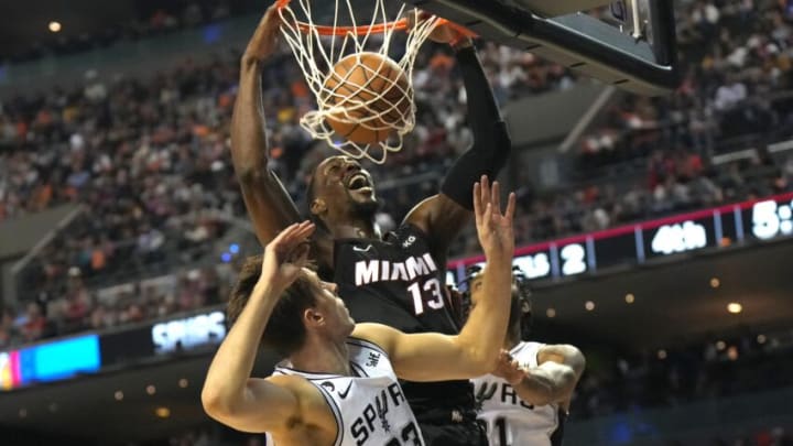 Miami Heat center Bam Adebayo (13)] dunks the ball against San Antonio Spurs forward Zach Collins (23)(Kirby Lee-USA TODAY Sports)