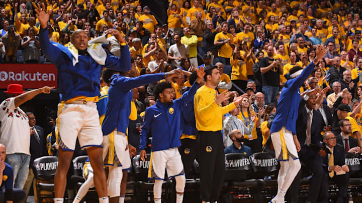 OAKLAND, CA - APRIL 24: the Golden State Warriors bench reacts during Game Five of Round One of the 2018 NBA Playoffs against the San Antonio Spurs on April 24, 2018 at ORACLE Arena in Oakland, California. NOTE TO USER: User expressly acknowledges and agrees that, by downloading and or using this photograph, user is consenting to the terms and conditions of Getty Images License Agreement. Mandatory Copyright Notice: Copyright 2018 NBAE (Photo by Noah Graham/NBAE via Getty Images)