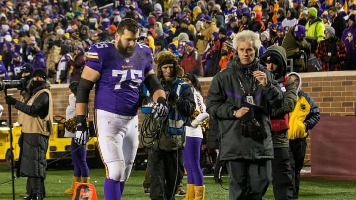 Dec 27, 2015; Minneapolis, MN, USA; Minnesota Vikings offensive lineman Matt Kalil (75) walks off the field with an injury during the fourth quarter against the New York Giants at TCF Bank Stadium. The Vikings defeated the Giants 49-17. Mandatory Credit: Brace Hemmelgarn-USA TODAY Sports