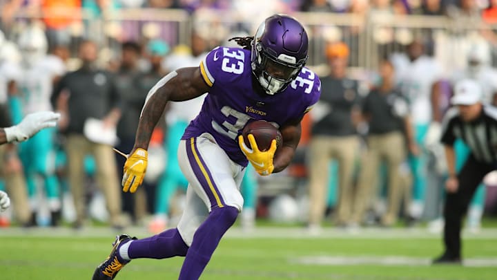 MINNEAPOLIS, MN – DECEMBER 16: Dalvin Cook #33 of the Minnesota Vikings carries the ball in the first quarter of the game against the Miami Dolphins at U.S. Bank Stadium on December 16, 2018 in Minneapolis, Minnesota. (Photo by Adam Bettcher/Getty Images)