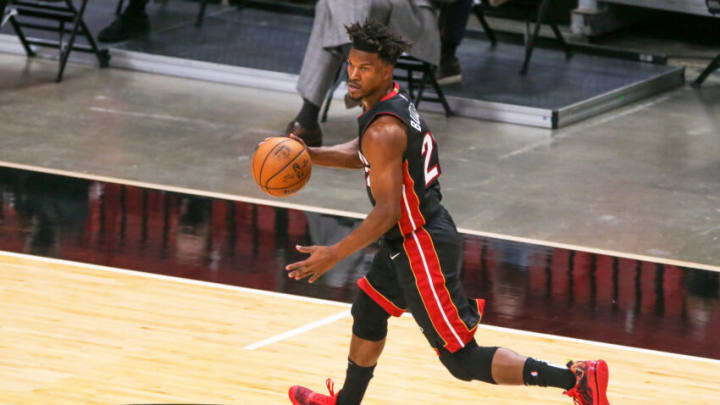 Feb 5, 2021; Miami, Florida, USA; Miami Heat forward Jimmy Butler (22) dribbles the basketball against the Washington Wizards during the first quarter of the game at American Airlines Arena. Mandatory Credit: Sam Navarro-USA TODAY Sports
