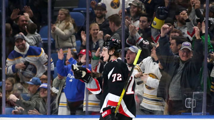 BUFFALO, NEW YORK - DECEMBER 13: Tage Thompson #72 of the Buffalo Sabres celebrates scoring a goal during the third period of an NHL hockey game against the Los Angeles Kings at KeyBank Center on December 13, 2022 in Buffalo, New York. (Photo by Joshua Bessex/Getty Images)
