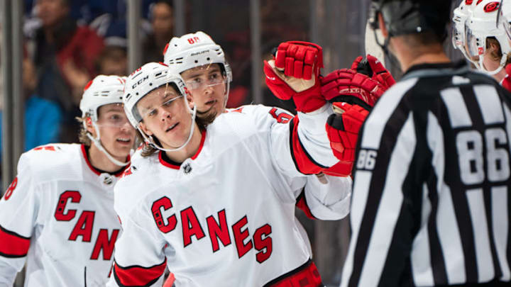 TORONTO, ON - DECEMBER 23: Erik Haula #56 of the Carolina Hurricanes celebrates with teammates during the second period against the Toronto Maple Leafs at the Scotiabank Arena on December 23, 2019 in Toronto, Ontario, Canada. (Photo by Kevin Sousa/NHLI via Getty Images)