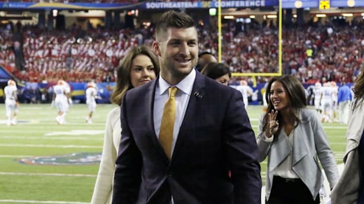 Dec 5, 2015; Atlanta, GA, USA; Florida Gators former quarterback Tim Tebow on the sideline during the game against the Alabama Crimson Tide in the 2015 SEC Championship Game at the Georgia Dome. Mandatory Credit: Brett Davis-USA TODAY Sports