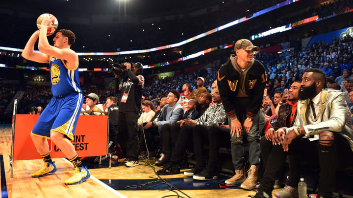 Feb 18, 2017; New Orleans, LA, USA; Golden State Warriors guard Stephen Curry (30) and Houston Rockets guard James Harden (13) watch as Golden State Warriors guard Klay Thompson (11) competes in the three-point contest during NBA All-Star Saturday Night at Smoothie King Center. Mandatory Credit: Bob Donnan-USA TODAY Sports