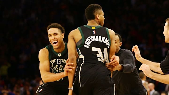 Jan 4, 2017; New York, NY, USA; Milwaukee Bucks forward Giannis Antetokounmpo (34) is congratulated by guard Malcolm Brogdon (13) after scoring the game winning basket at the buzzer against New York Knicks during the second half at Madison Square Garden. The Bucks won 105-104. Mandatory Credit: Andy Marlin-USA TODAY Sports