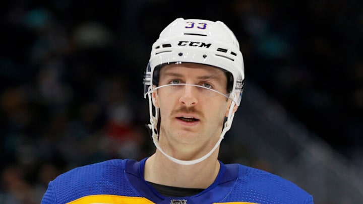 SEATTLE, WASHINGTON - NOVEMBER 04: Colin Miller #33 of the Buffalo Sabres looks on against the Seattle Kraken on November 04, 2021 at Climate Pledge Arena in Seattle, Washington. (Photo by Steph Chambers/Getty Images)