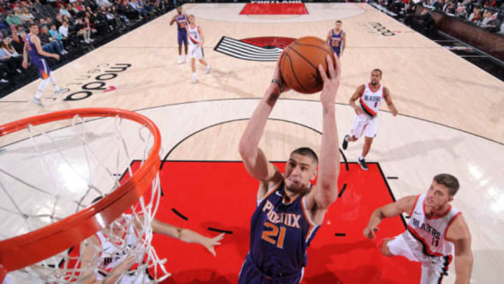 PORTLAND, OR – OCTOBER 3: Alex Len #21 of the Phoenix Suns goes to the basket against the Portland Trail Blazers on October 3, 2017 at the Moda Center in Portland, Oregon. NOTE TO USER: User expressly acknowledges and agrees that, by downloading and or using this Photograph, user is consenting to the terms and conditions of the Getty Images License Agreement. Mandatory Copyright Notice: Copyright 2017 NBAE (Photo by Sam Forencich/NBAE via Getty Images)