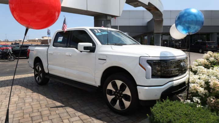 NILES, ILLINOIS - JULY 18: A 2023 Ford F-150 Lightning EV is offered for sale at Golf Mill Ford on July 18, 2023 in Niles, Illinois. Yesterday Ford announced that it was cutting prices on the Lightning truck by as much as $10,000. (Photo by Scott Olson/Getty Images)