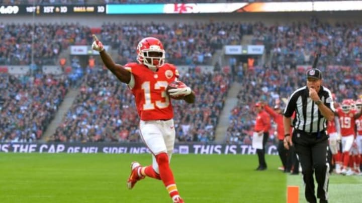 Nov 1, 2015; London, United Kingdom; Kansas City Chiefs running back De'Anthony Thomas (28) celebrates as he scores on a 10-yard touchdown run in the first quarter against the Detroit Lions during game 14 of the NFL International Series at Wembley Stadium. Mandatory Credit: Kirby Lee-USA TODAY Sports