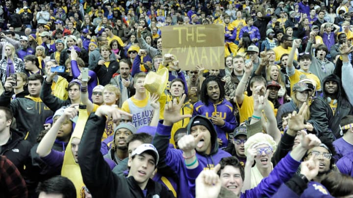 BATON ROUGE, LA - JANUARY 28: Fans of the LSU Tigers celebrate following a victory over the Kentucky Wildcats at the Pete Maravich Assembly Center on January 28, 2014 in Baton Rouge, Louisiana. LSU won the game 87-82. (Photo by Stacy Revere/Getty Images)