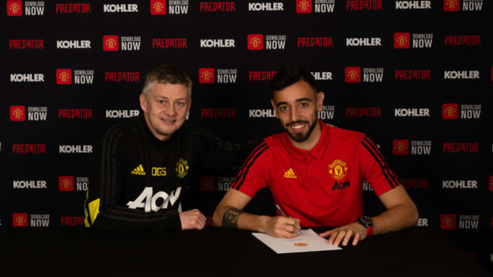 MANCHESTER, ENGLAND - JANUARY 30: (EXCLUSIVE COVERAGE) Bruno Fernandes of Manchester United poses with Manager Ole Gunnar Solskjaer after signing for the club at Aon Training Complex on January 30, 2020 in Manchester, England. (Photo by Manchester United/Manchester United via Getty Images)