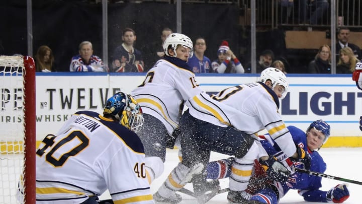 NEW YORK, NEW YORK – FEBRUARY 07: Carter Hutton #40 of the Buffalo Sabres makes the second period save on Kaapo Kakko #24 of the New York Rangers at Madison Square Garden on February 07, 2020 in New York City. (Photo by Bruce Bennett/Getty Images)