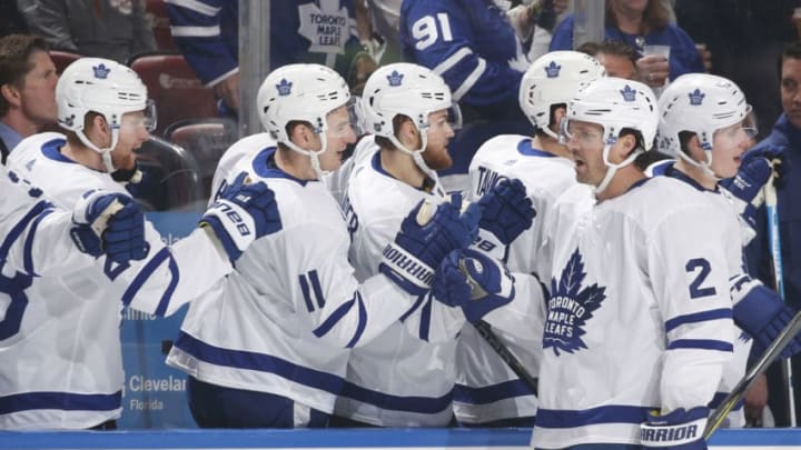 SUNRISE, FL - JANUARY 18: Teammates congratulate Ron Hainsey #2 of the Toronto Maple Leafs after he scored a first period goal against the Florida Panthers at the BB&T Center on January 18, 2019 in Sunrise, Florida. (Photo by Joel Auerbach/Getty Images)