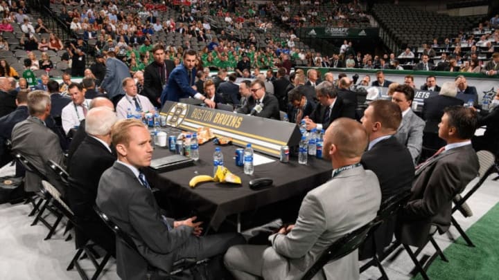 DALLAS, TX - JUNE 22: A general view of the Boston Bruins draft table is seen during the first round of the 2018 NHL Draft at American Airlines Center on June 22, 2018 in Dallas, Texas. (Photo by Brian Babineau/NHLI via Getty Images)