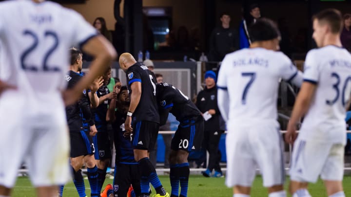 Mar 11, 2017; San Jose, CA, USA; San Jose Earthquakes midfielder Anibal Godoy (30) on his knees surrounded by teammates after scoring a goal against the Vancouver Whitecaps during the second half at Avaya Stadium. The San Jose Earthquakes defeated the Vancouver Whitecaps 3-2. Mandatory Credit: Kelley L Cox-USA TODAY Sports