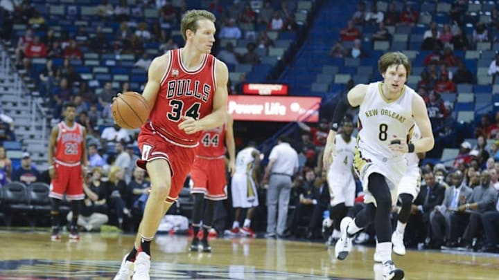 Apr 11, 2016; New Orleans, LA, USA; Chicago Bulls guard Mike Dunleavy (34) moves the ball down the court during the first quarter of the game against the New Orleans Pelicans at the Smoothie King Center. Mandatory Credit: Matt Bush-USA TODAY Sports