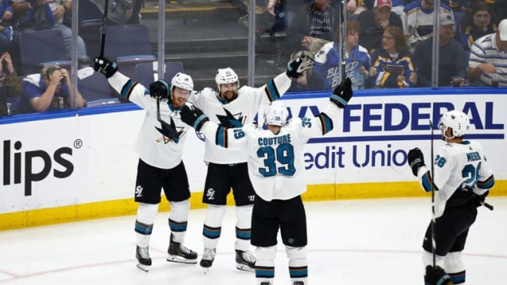 ST LOUIS, MISSOURI - MAY 15: Erik Karlsson #65 of the San Jose Sharks celebrates with his teammates after scoring the game winning goal in overtime to defeat the St. Louis Blues in Game Three of the Western Conference Finals during the 2019 NHL Stanley Cup Playoffs at Enterprise Center on May 15, 2019 in St Louis, Missouri. (Photo by Dilip Vishwanat/Getty Images)