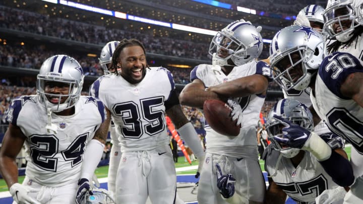 ARLINGTON, TEXAS – NOVEMBER 29: Chidobe Awuzie #24, Kavon Frazier #35 and other Dallas Cowboys celebrate the fourth quarter interception by Jourdan Lewis #27 against the New Orleans Saints at AT&T Stadium on November 29, 2018 in Arlington, Texas. (Photo by Richard Rodriguez/Getty Images)