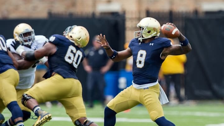 Apr 18, 2015; Notre Dame, IN, USA; Notre Dame Fighting Irish quarterback Malik Zaire (8) throws in the first quarter of the Blue-Gold Game at the LaBar Practice Complex. Mandatory Credit: Matt Cashore-USA TODAY Sports