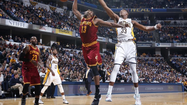 INDIANAPOLIS, IN – FEBRUARY 1: Myles Turner #33 of the Indiana Pacers fights for a rebound against Tristan Thompson #13 of the Cleveland Cavaliers in the first half of the game at Bankers Life Fieldhouse on February 1, 2016 in Indianapolis, Indiana. The Cavaliers defeated the Pacers 111-106 in overtime. NOTE TO USER: User expressly acknowledges and agrees that, by downloading and or using the photograph, User is consenting to the terms and conditions of the Getty Images License Agreement. (Photo by Joe Robbins/Getty Images)
