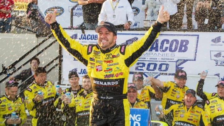 May 13, 2016; Dover, DE, USA; NASCAR Camping World Truck Series driver Matt Crafton celebrates in victory lane after winning the JACOB Companies 200 at Dover International Speedway. Mandatory Credit: Matthew O