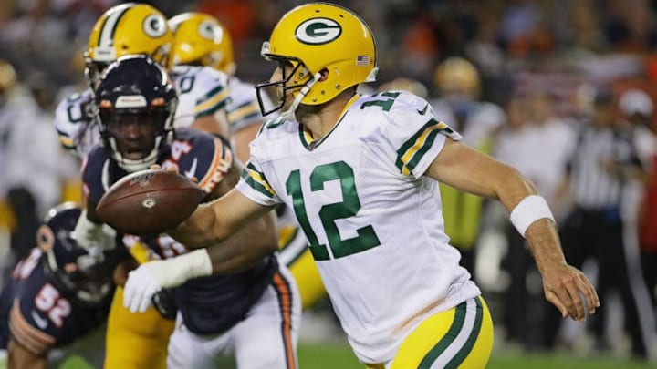CHICAGO, ILLINOIS - SEPTEMBER 05: Aaron Rodgers #12 of the Green Bay Packers rolls out for a shovel pass against the Chicago Bears at Soldier Field on September 05, 2019 in Chicago, Illinois. (Photo by Jonathan Daniel/Getty Images)