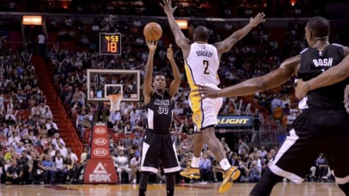 Jan 23, 2015; Miami, FL, USA; Miami Heat guard Norris Cole (30) is defended by Indiana Pacers guard Rodney Stuckey (2) during the first half at American Airlines Arena. Mandatory Credit: Steve Mitchell-USA TODAY Sports