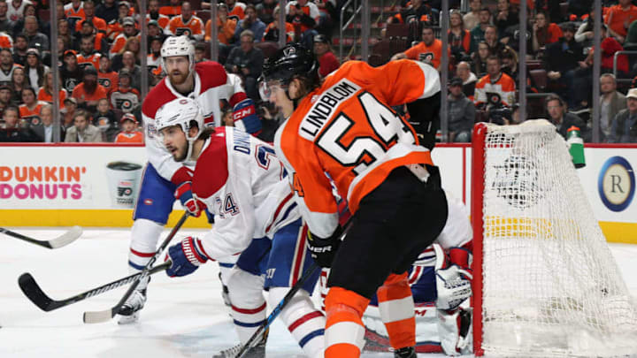PHILADELPHIA, PA - FEBRUARY 20: Making his NHL debut, Oskar Lindblom #54 of the Philadelphia Flyers positions himself on a scoring opportunity against Phillip Danault #24, Jeff Petry #26 and Carey Price #31 of the Montreal Canadiens on February 20, 2018 at the Wells Fargo Center in Philadelphia, Pennsylvania. (Photo by Len Redkoles/NHLI via Getty Images)