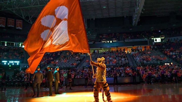 Clemson Tiger waves a flag before the game with South Carolina at Littlejohn Coliseum Sunday, December 15, 2019.Clemson Vs South Carolina Men S Basketball