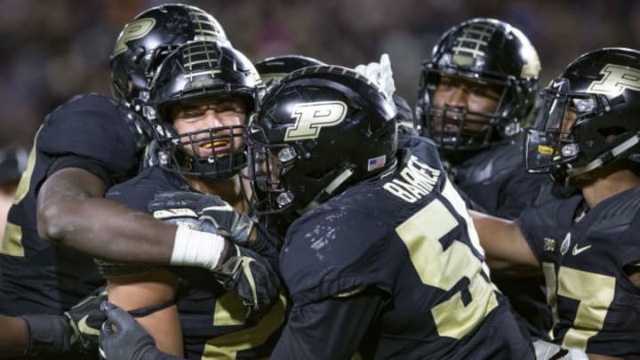 WEST LAFAYETTE, IN - OCTOBER 20: Markus Bailey #21 of the Purdue Boilermakers and members of the Purdue Boilermakers defense celebrate a touchdown against the Ohio State Buckeyes at Ross-Ade Stadium on October 20, 2018 in West Lafayette, Indiana. (Photo by Michael Hickey/Getty Images)