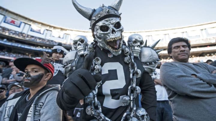 SAN DIEGO, CA - DECEMBER 18: An Oakland Raiders fan reacts en route to the Raiders 19-16 win over the San Diego Chargers at Qualcomm Stadium on December 18, 2016 in San Diego, California. (Photo by Donald Miralle/Getty Images)