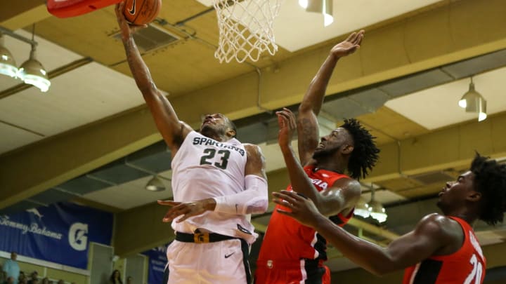 LAHAINA, HI – NOVEMBER 26: Xavier Tillman #23 of the Michigan State Spartans lays the ball in ahead of Amanze Ngumezi #25 of the Georgia Bulldogs during the first half at the Lahaina Civic Center on November 26, 2019 in Lahaina, Hawaii. (Photo by Darryl Oumi/Getty Images)